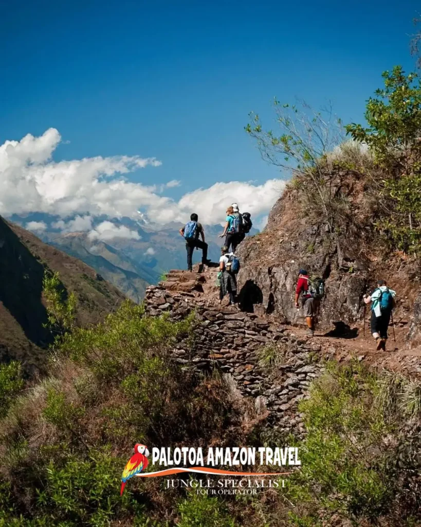 Tourists walking in the Inca trail.